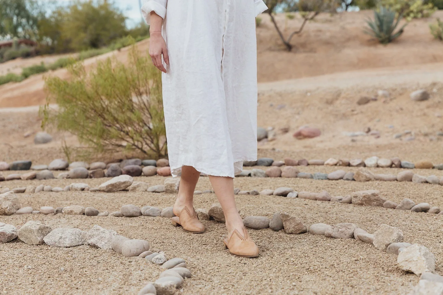 CIVANA Wellness Resort woman walking mindfulness labyrinth